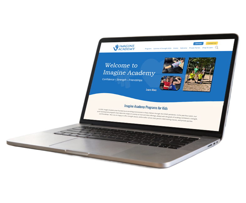 Imagine Academy website on laptop.